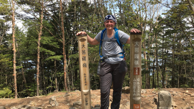 a photo of susan on the summit of mount daibosatsu her second mountain which she climbed almost a month to the day after finishing chemotherapy for breast cancer