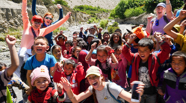 a photo of a team shot of american and nepal participants in a scavenger hunt