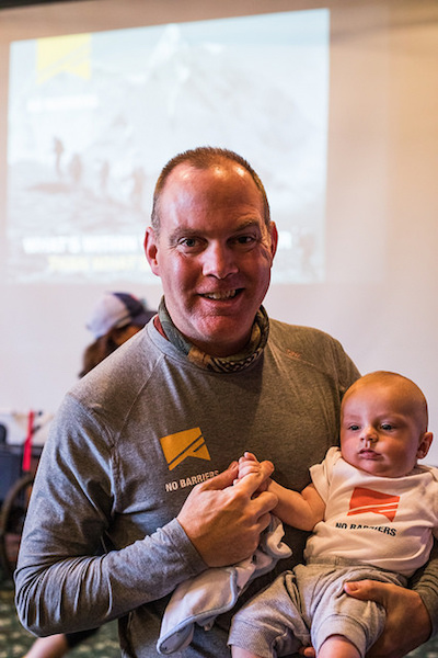 a photo of mike otoole and his baby with a no barriers onesie on at whats your everest 2018