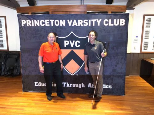 a photo of ed weihenmayer and erik weihenmayer in front a banner that says princeton varsity club at princeton university