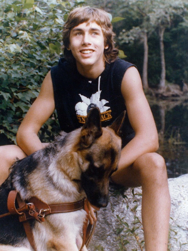 Erik Weihenmayer, aged 15, with his guide dog, Wizard. 