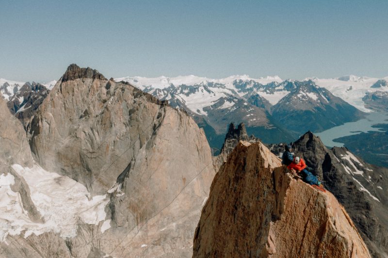Erik Weihenmayer and a climbing partner, Felipe Tapia-Nordenflycht enjoying the crisp air at the top of the South Tower in Torres del Paine, Patagonia, 2023.